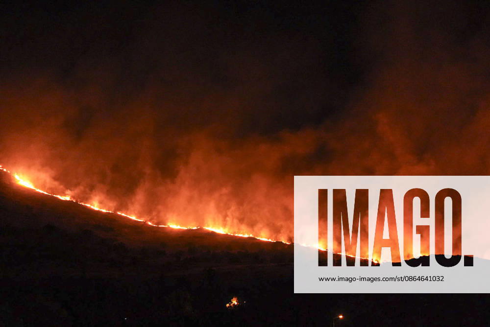 Firefighters respond to fire in wooded area in Ankara ANKARA, TURKIYE - AUGUST 23: Smoke rises from a wooded area in the Mamak district of Ankara, Turkiye on August 23, 2026, as firefighters work to extinguish the wide-scale fire using two fire trucks and three water tankers. Metin Aktas Anadolu Ankara Turkey. Editorial use only. Please get in touch for any other usage.