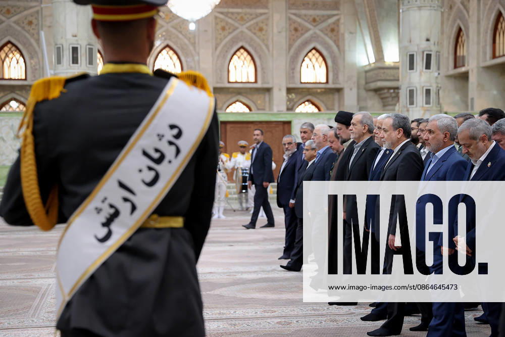 President Masoud Pezeshkian (5-R) attends an event to mark the first day of the Government Week at the mausoleum of Ayatollah Ruhollah Khomeini, the founder of the Islamic Republic of Iran, in Tehran, Iran on August 23, 2026. Iranian President Masoud Pezeshkian declared that no power will be able to force the Iranian people into surrender. He dismissed claims that sanctions would turn Iran into another Venezuela, saying that has not happened. He stressed the need to begin conserving gasoline consumption through government measures, including a plan to reduce the number and fuel use of government vehicles. IRN2026082305 IranianxPresidency