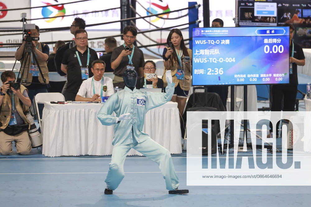 A robot competes during the Tai Chi event on day 2 of the 2nd World Humanoid Robot Games at National Speed Skating Oval on August 23, 2026 in Beijing, China.