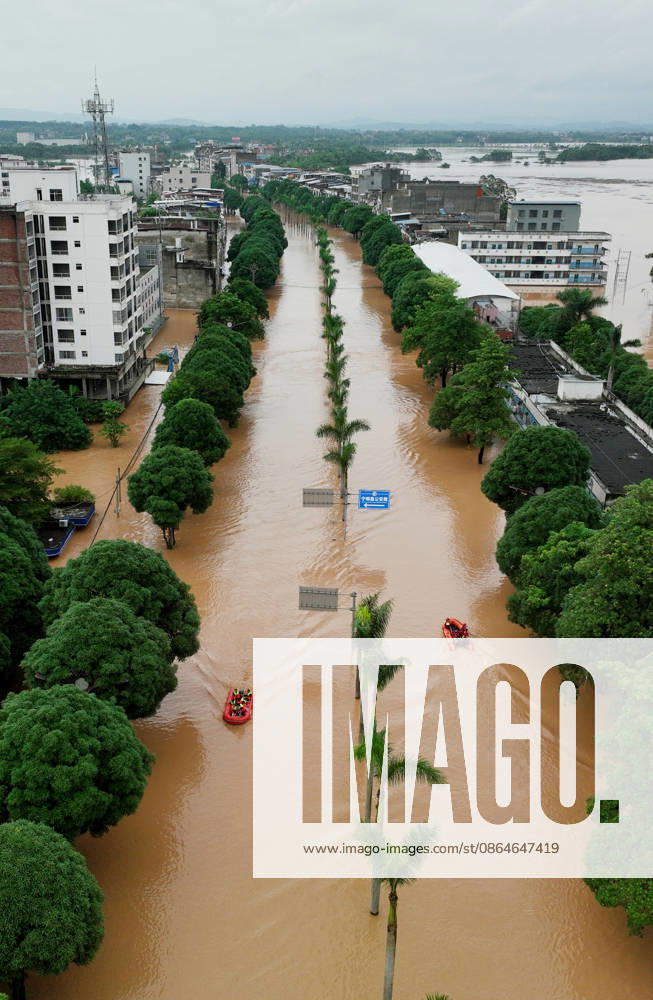 Residents evacuate as floods hit Chengzhong Town in Ningming County due to a typhoon on August 23, 2026 in Ningming, Guangxi Zhuang Autonomous Region of China.
