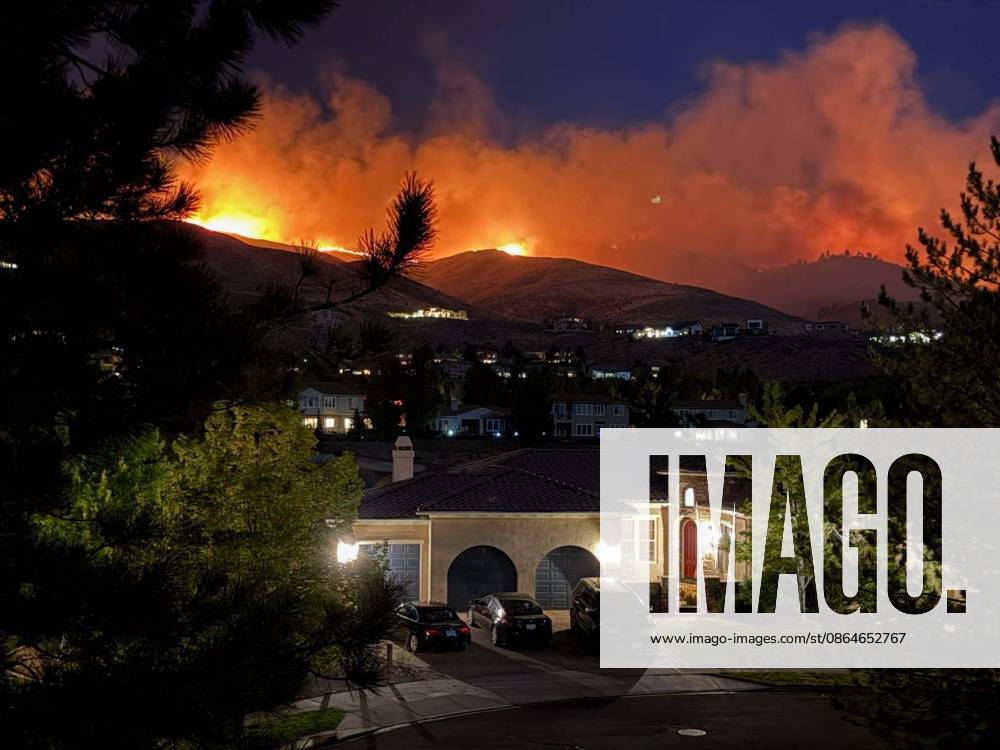 Firefighting efforts continue against Hawk Fire in Nevada RENO, NEVADA, UNITED STATES - AUGUST 23: (---- - MANDATORY CREDIT - TRUCKEE MEADOWS FIRE PROTECTION DISTRICT HANDOUT - NO MARKETING NO ADVERTISING CAMPAIGNS - DISTRIBUTED AS A SERVICE TO CLIENTS----) Firefighters work to extinguish hotspots as efforts continue to keep the Hawk Fire south of U.S. 395 near Reno, Nevada, United States, on August 23, 2026. The fire remained within its existing footprint as crews continued operations, while damage assessment teams inspected structures in affected areas. Truckee Meadows Fire Protection District Anadolu Reno United States. Editorial use only. Please get in touch for any other usage.