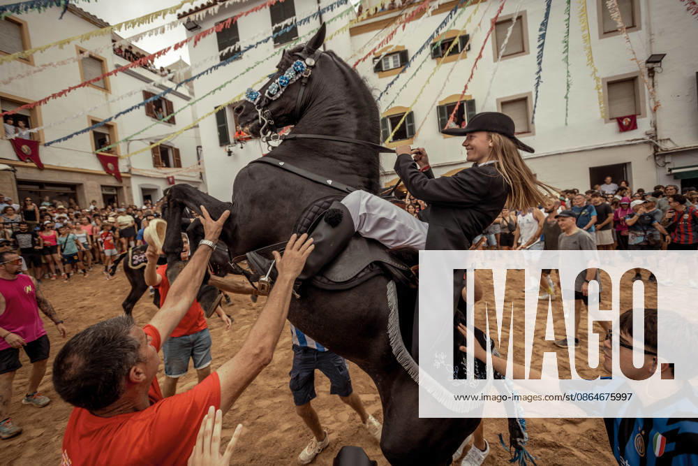 A caixer, or horse rider, rears his horse amid a cheering crowd during the traditional Jaleo at the Sant Bartomeu Festival in Ferreries. Ferreries Spain - ZUMAo105 20260824_fap_o105_009