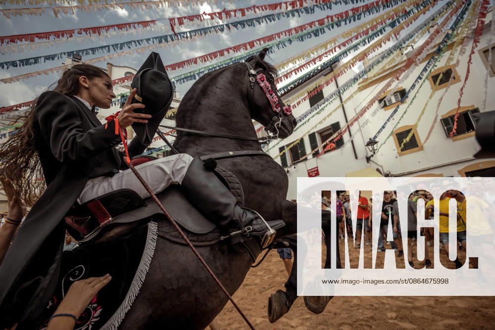 A caixer, or horse rider, rears his horse amid a cheering crowd during the traditional Jaleo at the Sant Bartomeu Festival in Ferreries. Ferreries Spain - ZUMAo105 20260824_fap_o105_016