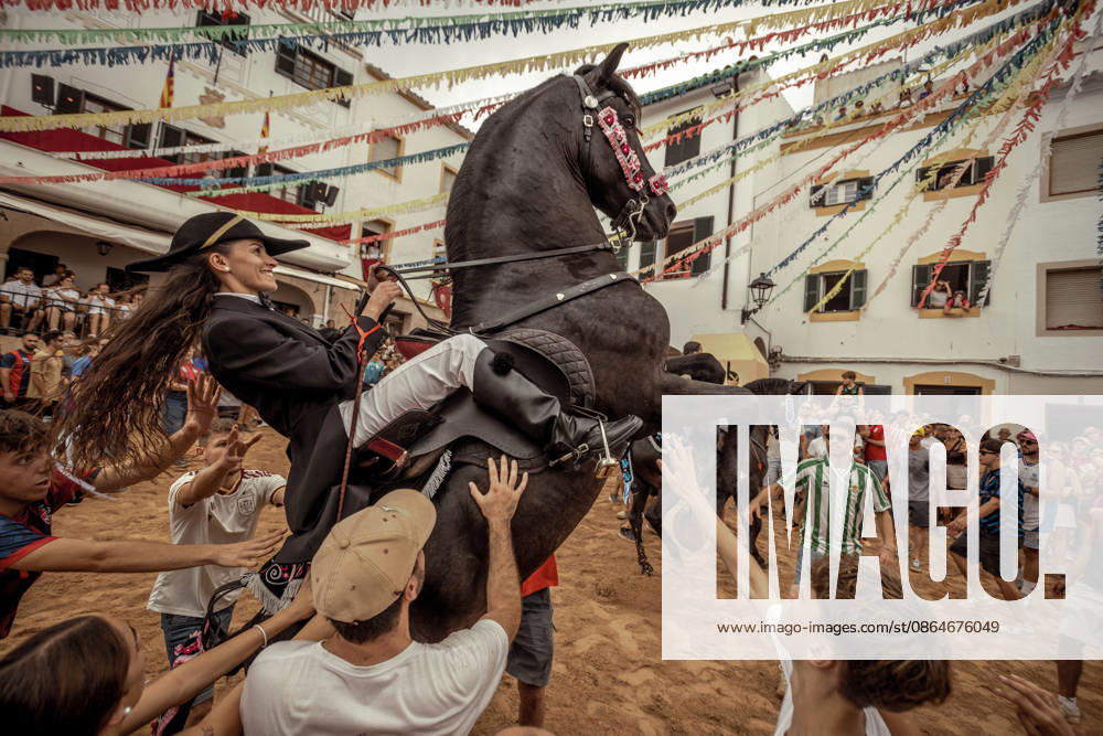 A caixer, or horse rider, rears his horse amid a cheering crowd during the traditional Jaleo at the Sant Bartomeu Festival in Ferreries. Ferreries Spain - ZUMAo105 20260824_fap_o105_026