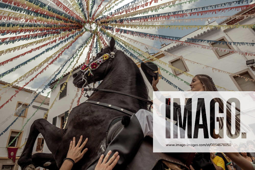 A caixer, or horse rider, rears his horse amid a cheering crowd during the traditional Jaleo at the Sant Bartomeu Festival in Ferreries. Ferreries Spain - ZUMAo105 20260824_fap_o105_012