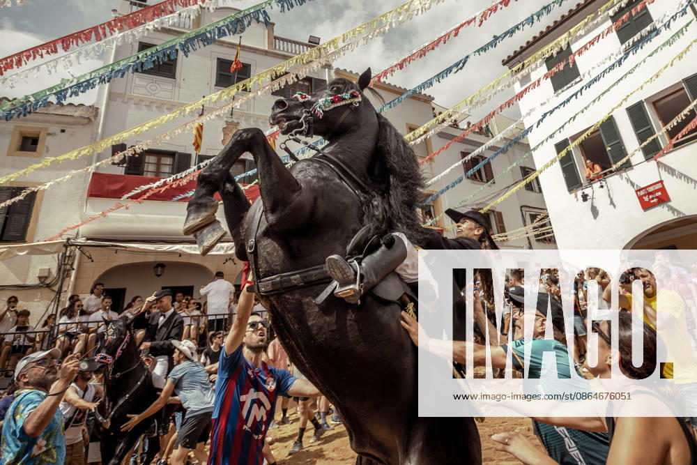 A caixer, or horse rider, rears his horse amid a cheering crowd during the traditional Jaleo at the Sant Bartomeu Festival in Ferreries. Ferreries Spain - ZUMAo105 20260824_fap_o105_027