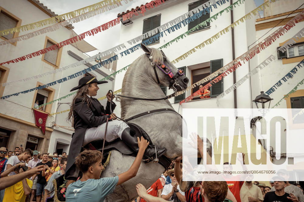 A caixer, or horse rider, rears his horse amid a cheering crowd during the traditional Jaleo at the Sant Bartomeu Festival in Ferreries. Ferreries Spain - ZUMAo105 20260824_fap_o105_029
