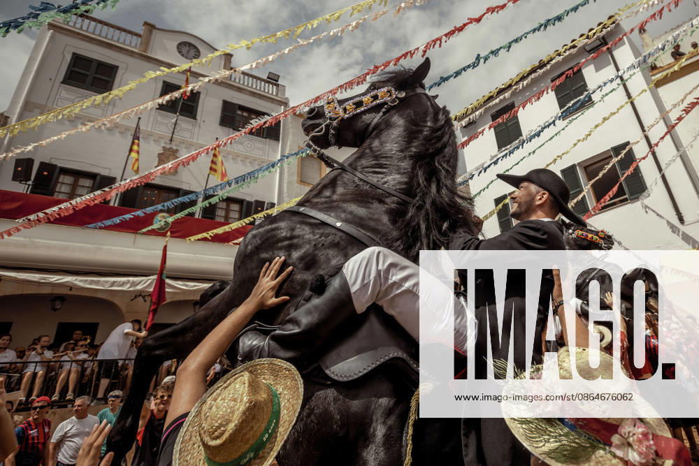A caixer, or horse rider, rears his horse amid a cheering crowd during the traditional Jaleo at the Sant Bartomeu Festival in Ferreries. Ferreries Spain - ZUMAo105 20260824_fap_o105_036