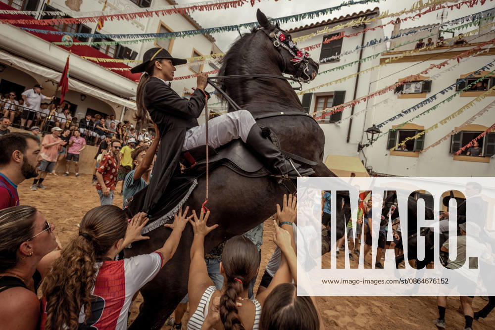 A caixer, or horse rider, rears his horse amid a cheering crowd during the traditional Jaleo at the Sant Bartomeu Festival in Ferreries. Ferreries Spain - ZUMAo105 20260824_fap_o105_017
