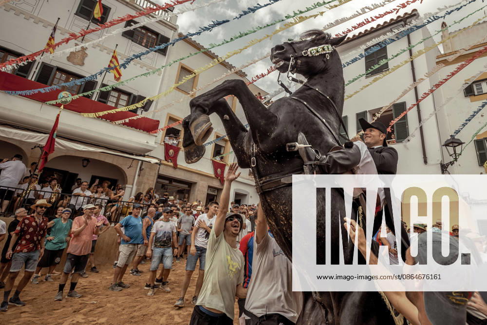 A caixer, or horse rider, rears his horse amid a cheering crowd during the traditional Jaleo at the Sant Bartomeu Festival in Ferreries. Ferreries Spain - ZUMAo105 20260824_fap_o105_038