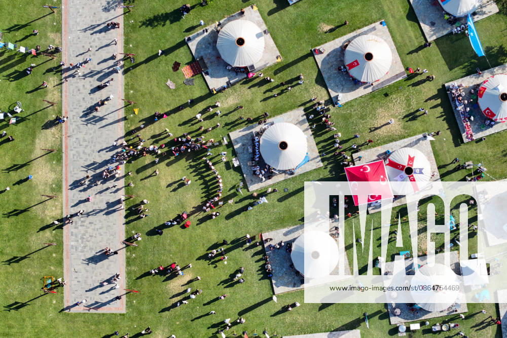 955th Anniversary of Malazgirt Victory in Bitlis, Turkiye BITLIS, TURKIYE - AUGUST 25: An aerial view shows crowds and traditional tents at Recep Tayyip Erdogan Ahlat National Garden during events marking the 955th anniversary of the Malazgirt Victory (Battle of Manzikert), on August 25, 2026 in Ahlat, Bitlis, Turkiye. The celebrations, held in the Carho area and centered around the Sultan Alparslan encampment, continued for a third day and drew residents as well as visitors from across the country. The 1071 Battle of Manzikert is widely regarded as a major turning point in Anatolian history, accelerating Turkic settlement in the region following the Seljuk victory over the Byzantine Empire. Ozkan Bilgin Anadolu Bitlis Turkey. Editorial u