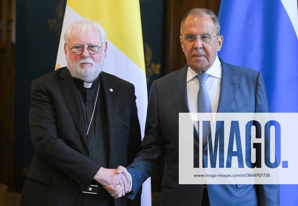Russia Vatican 9228294 25.08.2026 Russian Foreign Minister Sergey Lavrov and Vatican s Secretary for Relations with States Paul Richard Gallagher, left, shake hands as they pose for a photo during a meeting in Moscow, Russia. Sergey Guneev Sputnik Moscow Russia