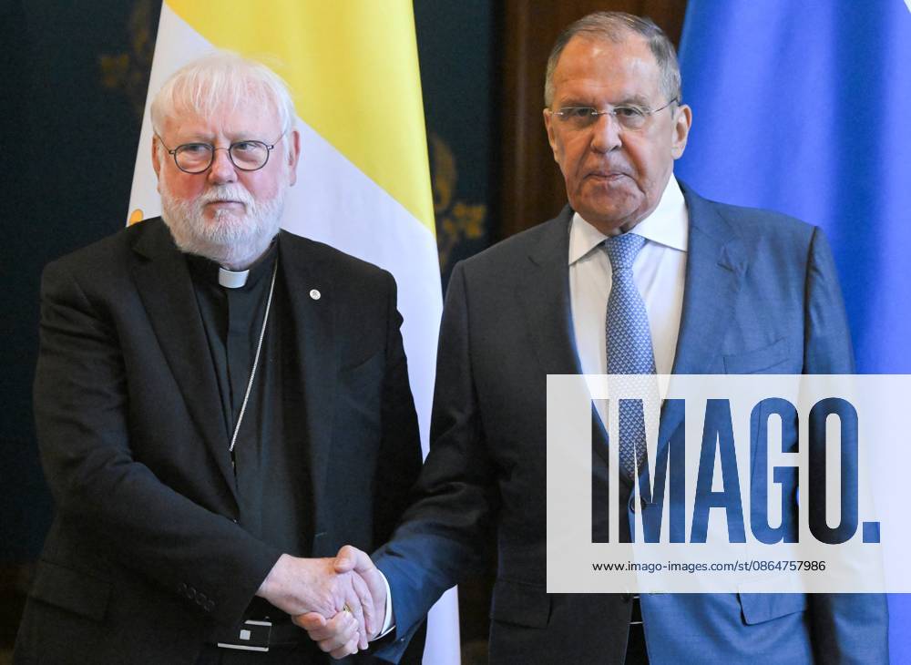 Russia Vatican 9228296 25.08.2026 Russian Foreign Minister Sergey Lavrov and Vatican s Secretary for Relations with States Paul Richard Gallagher, left, shake hands as they pose for a photo during a meeting in Moscow, Russia. Sergey Guneev Sputnik Moscow Russia