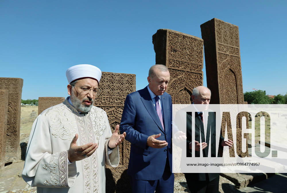 Turkish President Recep Tayyip Erdogan visits Seljuk Square Cemetery in eastern Turkiye BITLIS, TURKIYE - AUGUST 25: (---- - MANDATORY CREDIT - TURKISH PRESIDENCY MURAT CETINMUHURDAR HANDOUT - NO MARKETING NO ADVERTISING CAMPAIGNS - DISTRIBUTED AS A SERVICE TO CLIENTS----) Turkish President Recep Tayyip Erdogan (C), President of Religious Affairs Safi Arpagus (L) and Nationalist Movement Party (MHP) Chairman Devlet Bahceli (R) pray during their visit to the Seljuk Square Cemetery in Ahlat district of Bitlis, Turkiye, on August 25, 2026. Turkish President Recep Tayyip Erdogan visited Ahlat as part of events marking the 955th anniversary of the Victory of Malazgirt. Turkish Presidency Murat Cetinmuhurdar Anadolu Bit