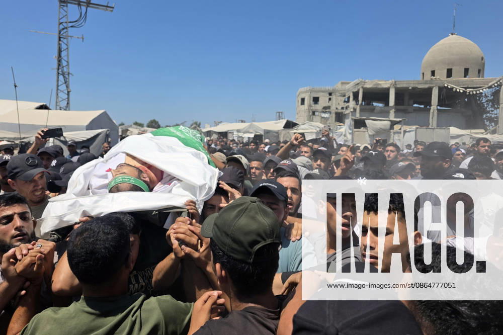 Palestinians Bury Three People in Khan Younis Palestinians attend the funeral of three people in Khan Younis, in the southern Gaza Strip, on August 25, 2026. Two died from wounds sustained in previous Israeli strikes, while the third was killed in an Israeli strike the previous evening. Photo by Tariq Mohammad APA Images Khan Yunis Gaza Strip Palestinian Territory 250826_Khan_Yunis_TM_04(37)