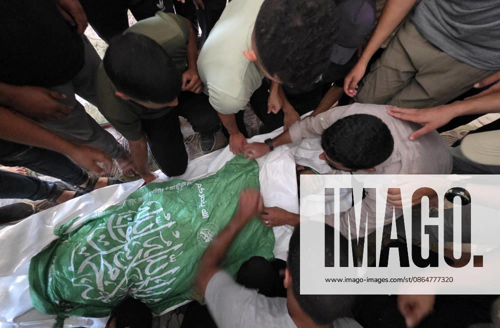 Palestinians Bury Three People in Khan Younis Palestinians attend the funeral of three people in Khan Younis, in the southern Gaza Strip, on August 25, 2026. Two died from wounds sustained in previous Israeli strikes, while the third was killed in an Israeli strike the previous evening. Photo by Tariq Mohammad APA Images Khan Yunis Gaza Strip Palestinian Territory 250826_Khan_Yunis_TM_04(3)