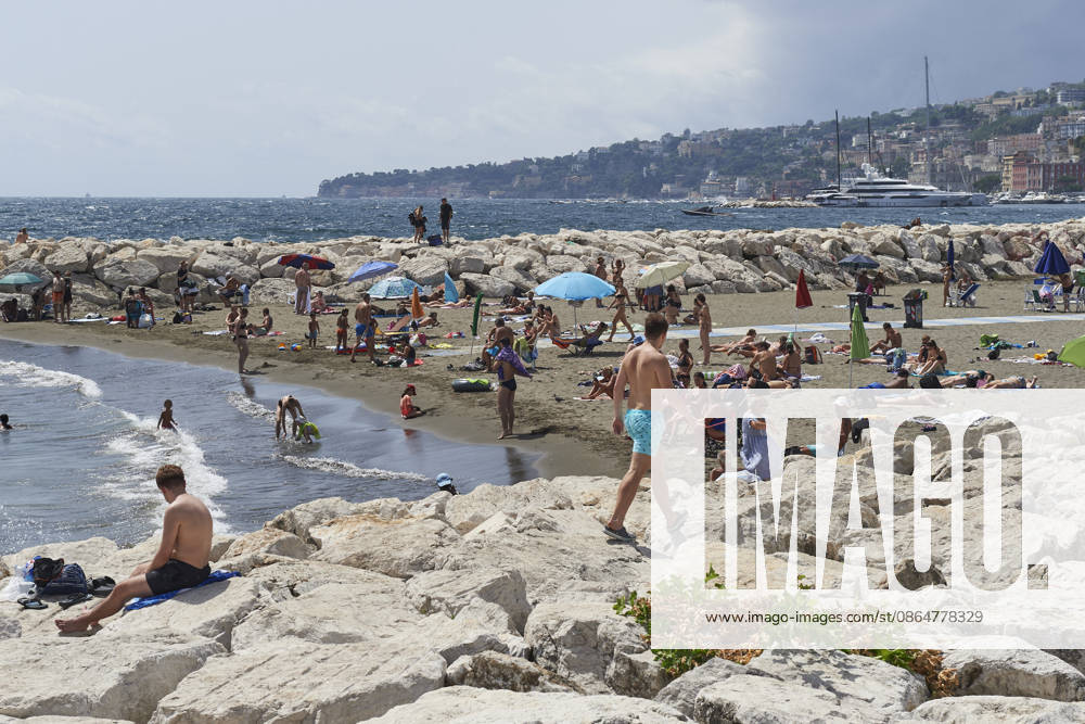 The fifth wave of the African heatwave in Naples NAPLES, ITALY - AUGUST 25: People sunbath and swim during the African heatwave in Naples on August 25, 2026. The fifth wave of the African heatwave is currently underway in Central-Southern Italy, with temperatures reaching 40-45 degrees. Eliano Imperato Anadolu Naples Italy. Editorial use only. Please get in touch for any other usage.