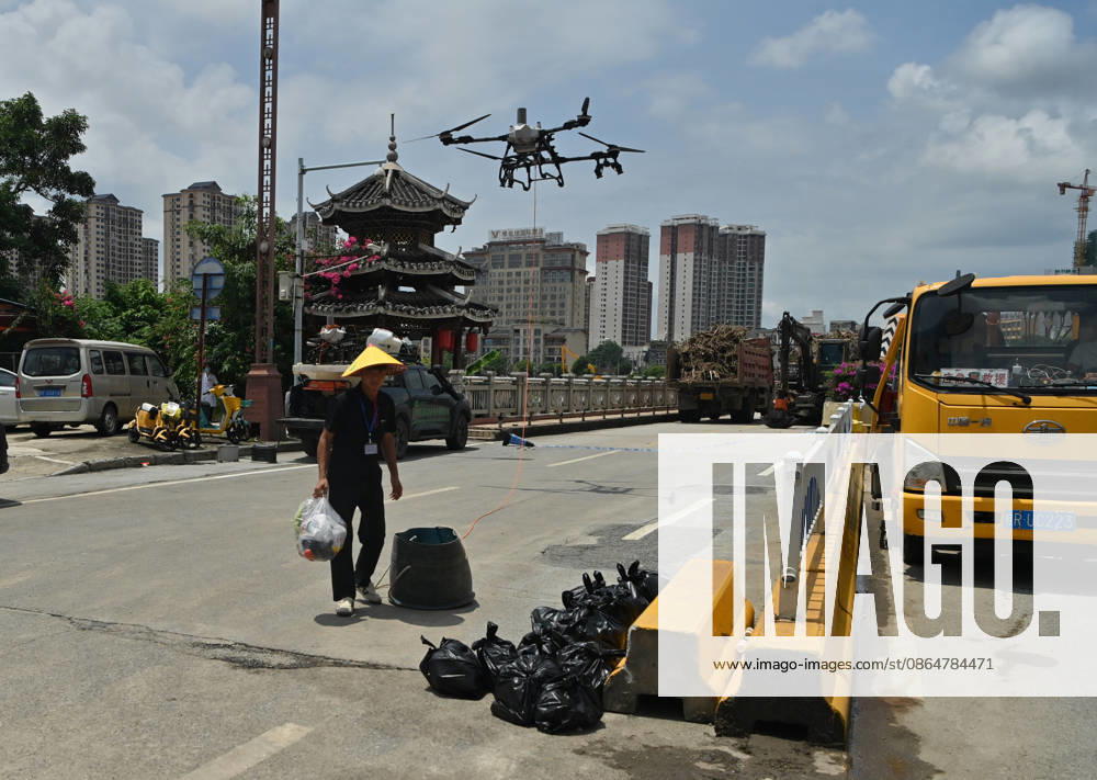 (260825) -- CHONGZUO, Aug. 25, 2026 -- A rescuer operates a drone to transport supplies in Ningming Couty, Chongzuo City, south China s Guangxi Zhuang Autonomous Region, Aug. 25, 2026. Continuous heavy rainfalls caused by Typhoon Narra, the 19th typhoon of the year, have swept many areas in Ningming. Local authorities have fully engaged in rescue and relief efforts. As of 12:00 p.m. (Beijing Time) on Tuesday, 22,008 stranded civilians had been transferred. ) CHINA-GUANGXI-NINGMING-TYPHOON-STRANDED RESIDENTS-TRANSFER (CN) ZhouxHua