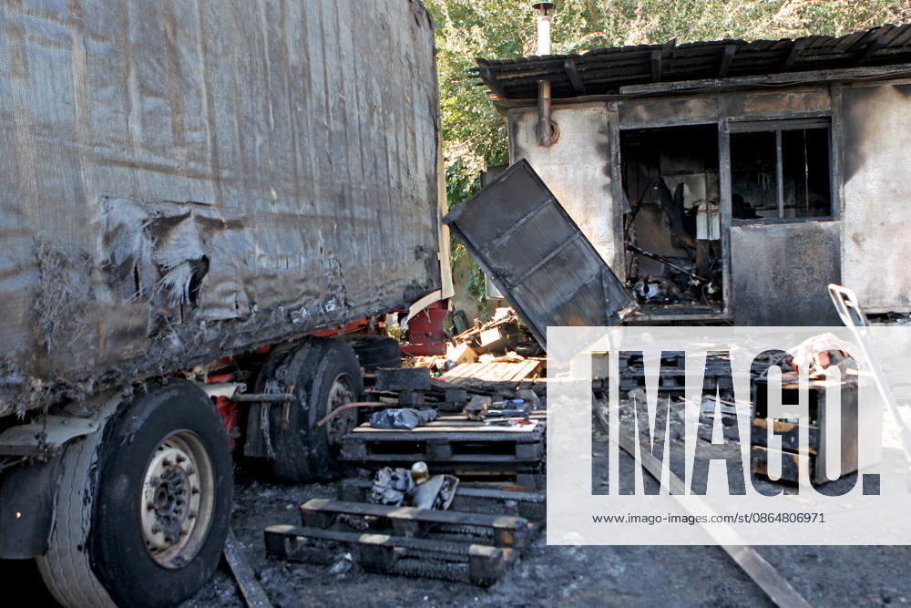 A trailer truck and burnt wooden pallets that caught fire as a result of a nighttime Russian UAV attack are in a parking lot near a shopping and entertainment centre in Dnipro, Ukraine, August 25, 2026. Fires broke out inside and near the shopping mall as a result of the Russian attack. (Photo by Mykola Miakshykov Ukrinform) Russian attack hits parking lot near shopping mall in Dnipro suburb