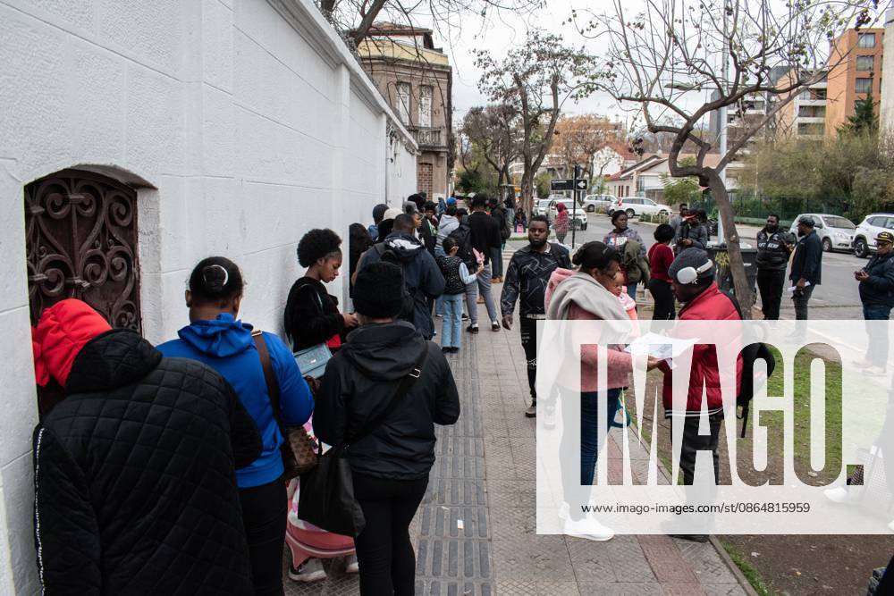 Haitians seek immigration regularization in Santiago SANTIAGO, CHILE, AUGUST 25, 2026: Haitian citizens gather at the Consulate of Haiti in Santiago to complete paperwork related to the regularization of their immigration status in Chile. Santiago Chile