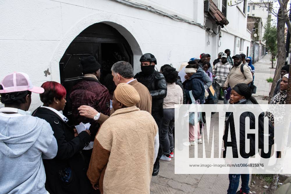 Haitians seek immigration regularization in Santiago SANTIAGO, CHILE, AUGUST 25, 2026: Haitian citizens gather at the Consulate of Haiti in Santiago to complete paperwork related to the regularization of their immigration status in Chile. Santiago Chile
