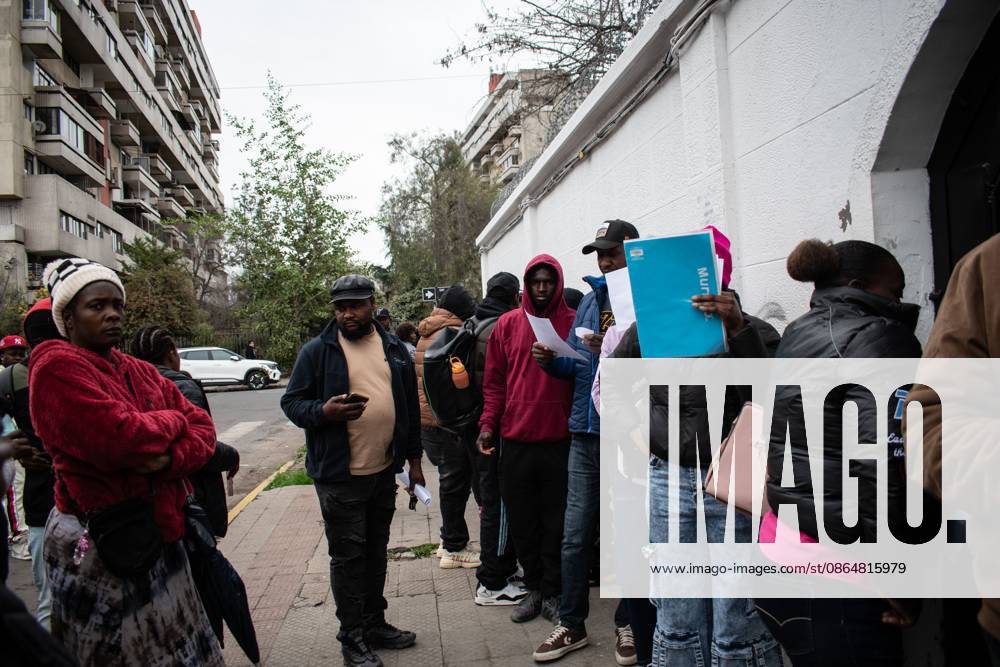 Haitians seek immigration regularization in Santiago SANTIAGO, CHILE, AUGUST 25, 2026: Haitian citizens gather at the Consulate of Haiti in Santiago to complete paperwork related to the regularization of their immigration status in Chile. Santiago Chile