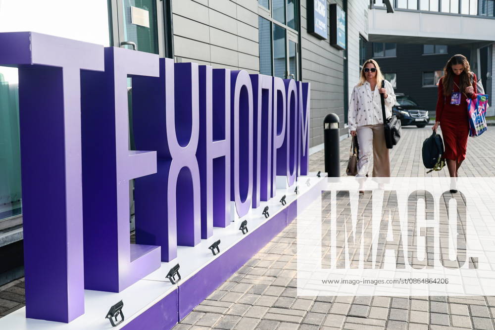 RUSSIA, NOVOSIBIRSK - AUGUST 26, 2026: Women are seen outside the Novosibirsk Expocentre which hosts Technoprom 2026, the 13th International Technological Development Forum. Kirill Kukhmar TASS 96648992