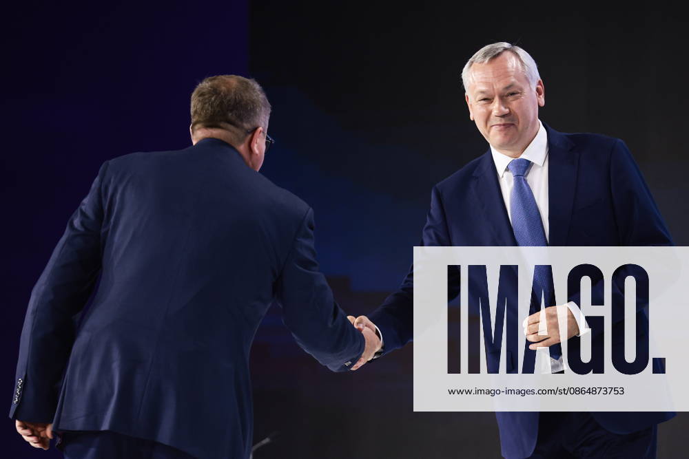RUSSIA, NOVOSIBIRSK - AUGUST 26, 2026: Novosibirsk Region Governor Andrei Travnikov (R) attends the opening of Technoprom 2026, the 13th International Technological Development Forum, at the Novosibirsk Expocentre. Kirill Kukhmar TASS 96649408