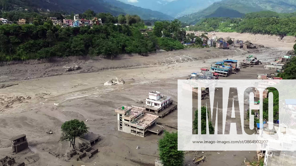 Flash flood ravages Nepals Rasuwa Rasuwa Nepal , Aug 26 (ANI): An aerial view of the houses partially submerged in mud-laden flash flood following an outburst in the Bhotekoshi River, in Rasuwa on Wednesday. (ANI Video Grab) Rasuwa Nepal
