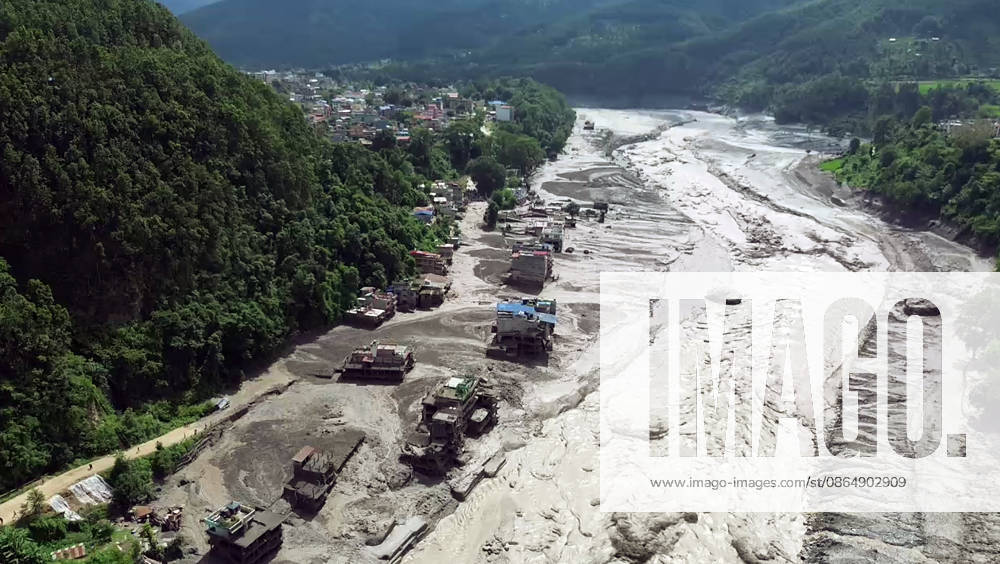 Flash flood ravages Nepals Rasuwa Rasuwa Nepal , Aug 26 (ANI): An aerial view of mud-laden flash flood following an outburst in the Bhotekoshi River, in Rasuwa akot on Wednesday. (ANI Video Grab) Rasuwa Nepal