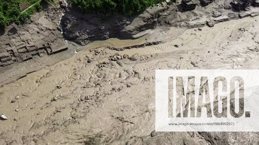 Flash flood ravages Nepals Rasuwa Rasuwa Nepal , Aug 26 (ANI): An aerial view of a mud-laden flash flood following an outburst in the Bhotekoshi River, in Rasuwa akot on Wednesday. (ANI Video Grab) Rasuwa Nepal