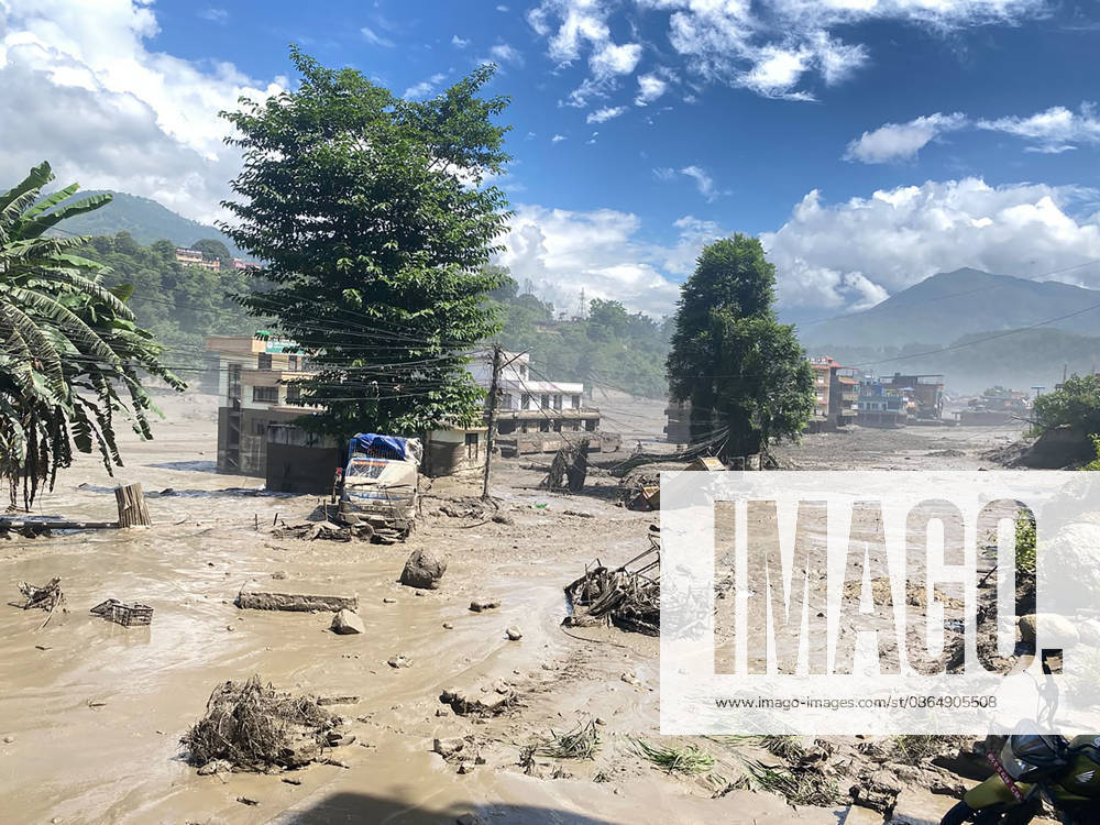 (260826) -- KATHMANDU, Aug. 26, 2026 -- This photo taken on Aug. 26, 2026 shows an area affected by flash floods in Nuwakot District, Nepal. The death toll from a massive flash flood in Nepal s Bhote Koshi River on Wednesday reached 22, the police said. The Nepal Tourism Board said that as many as 384 tourists, including 291 foreigners, have been reported missing after a massive flash flood swept through Rasuwa district in northern Nepal. ( via Xinhua) Photo Flash Death toll hits 22 in flash flood in Nepal: police RSS