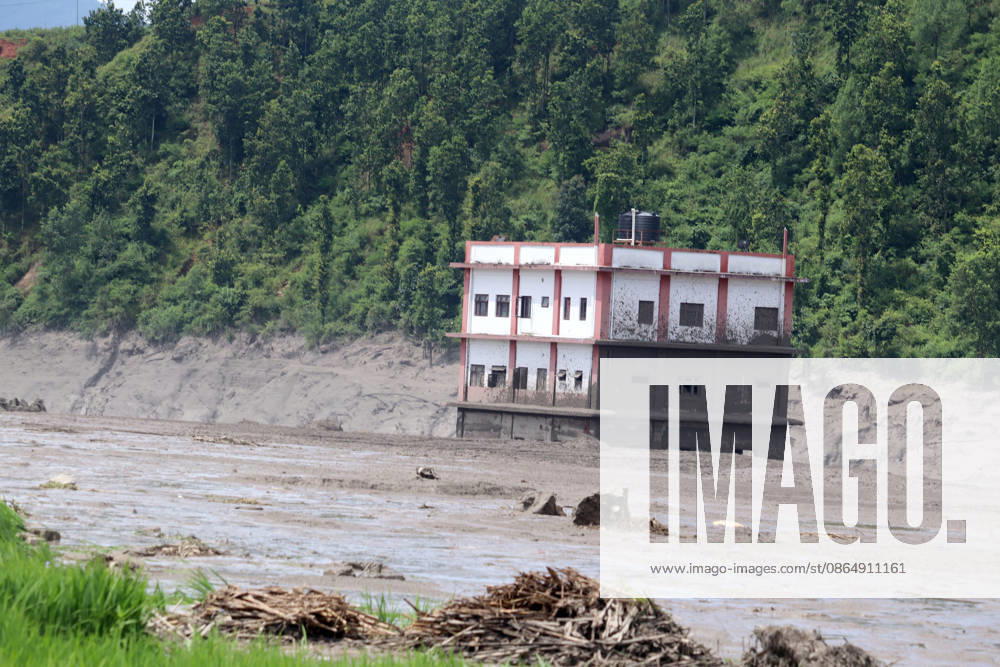 (260826) -- KATHMANDU, Aug. 26, 2026 -- This photo taken on Aug. 26, 2026 shows a damaged building after flash floods in Nuwakot District, Nepal. As many as 72 people have been found dead in the flash flood in the Bhote Koshi River in Nepal, police said. Abi Narayan Kafle, spokesperson of Nepal Police, confirmed to Xinhua, adding that 41 injured people have been receiving treatment in different hospitals. ( via Xinhua) (SpotNews) NEPAL-NUWAKOT-FLASH FLOODS-DEATH TOLL RSS