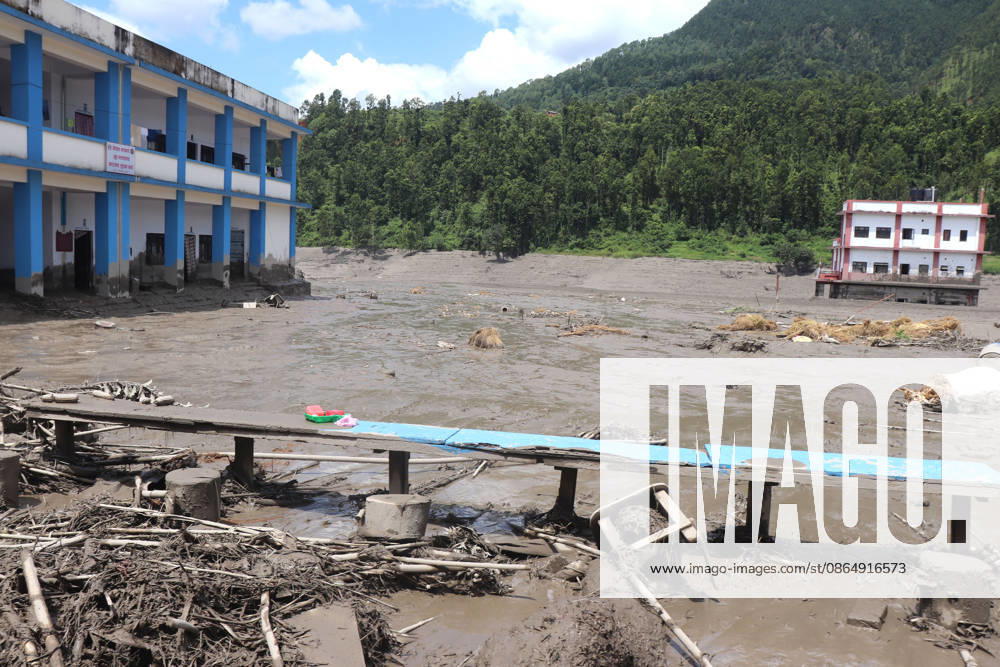 (260826) -- KATHMANDU, Aug. 26, 2026 -- This photo taken on Aug. 26, 2026 shows damaged buildings after flash floods in Nuwakot District, Nepal. As many as 72 people have been found dead in the flash flood in the Bhote Koshi River in Nepal, police said. Abi Narayan Kafle, spokesperson of Nepal Police, confirmed to Xinhua, adding that 41 injured people have been receiving treatment in different hospitals. (RSS via Xinhua) (SpotNews) NEPAL-FLASH FLOODS-AFTERMATH ZhangxPing
