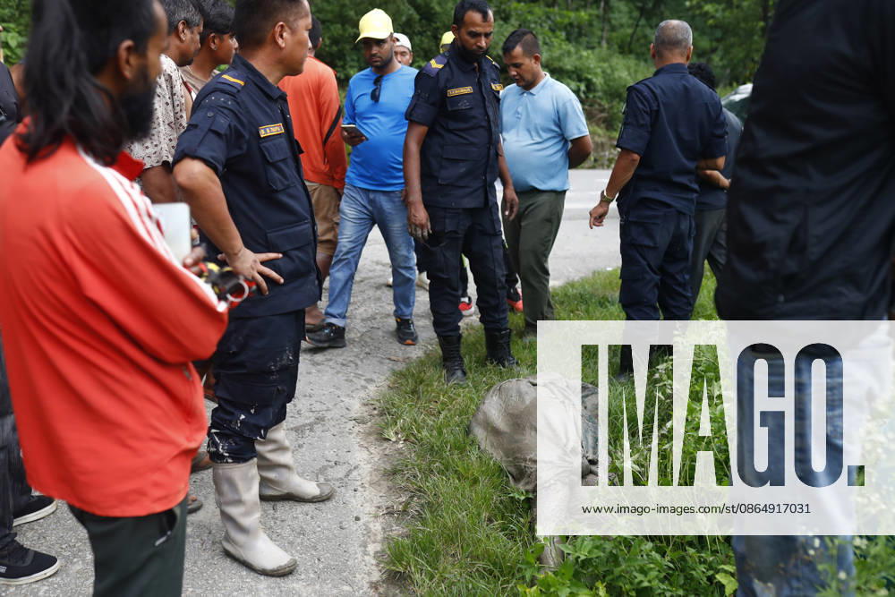 The body of a woman is pictured on the ground after recovery efforts from buildings and infrastructure that were damaged along the swollen Trishuli River following a massive flash flood triggered by an avalanche of ice and rock in the upper Lhende River on the Tibetan side, in Nuwakot district, Nepal, on Wednesday, August 26, 2026. The sudden flood swept through communities along the Bhote Koshi and Trishuli river systems, destroying homes, roads and bridges and leaving widespread devastation downstream. Nuwakot Nepal - ZUMAg200 20260826_zap_g200_001