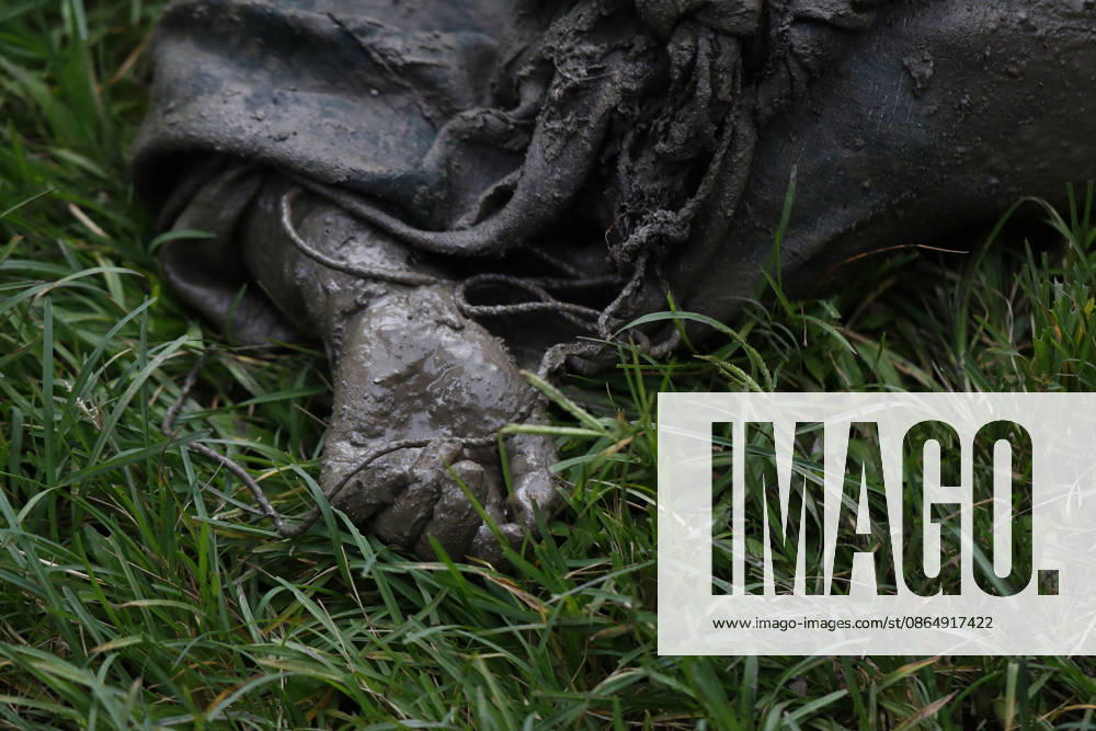 The body of a woman is pictured on the ground after recovery efforts from buildings and infrastructure that were damaged along the swollen Trishuli River following a massive flash flood triggered by an avalanche of ice and rock in the upper Lhende River on the Tibetan side, in Nuwakot district, Nepal, on Wednesday, August 26, 2026. The sudden flood swept through communities along the Bhote Koshi and Trishuli river systems, destroying homes, roads and bridges and leaving widespread devastation downstream. Nuwakot Nepal - ZUMAg200 20260826_zap_g200_003