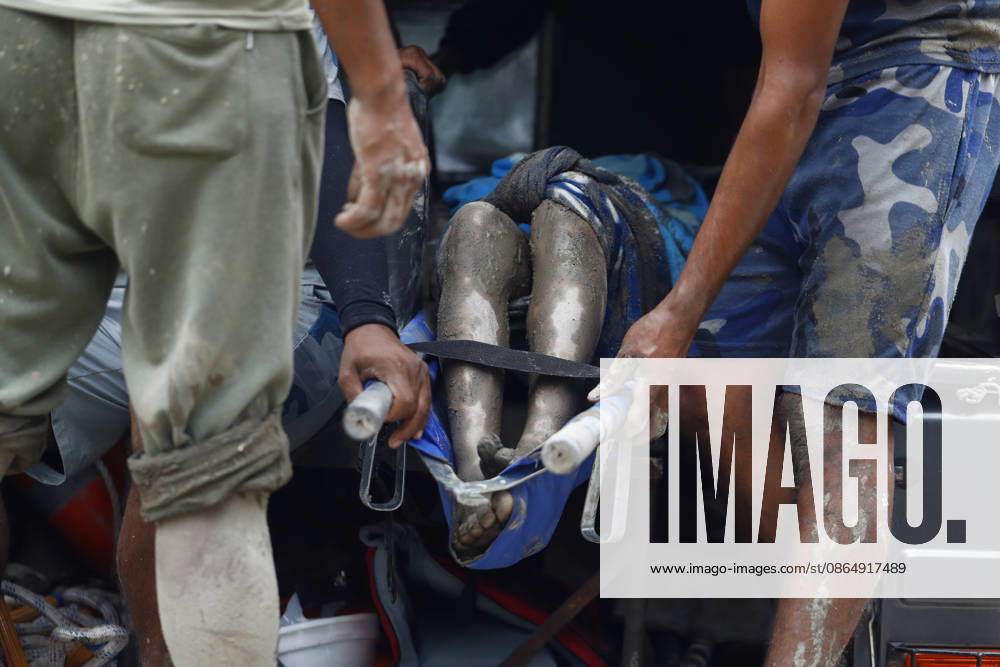 A dead body is pictured inside a rescue vehicle as buildings and infrastructure were damaged along the swollen Trishuli River following a massive flash flood triggered by an avalanche of ice and rock in the upper Lhende River on the Tibetan side, in Nuwakot district, Nepal, on Wednesday, August 26, 2026. The sudden flood swept through communities along the Bhote Koshi and Trishuli river systems, destroying homes, roads and bridges and leaving widespread devastation downstream. Nuwakot Nepal - ZUMAg200 20260826_zap_g200_006