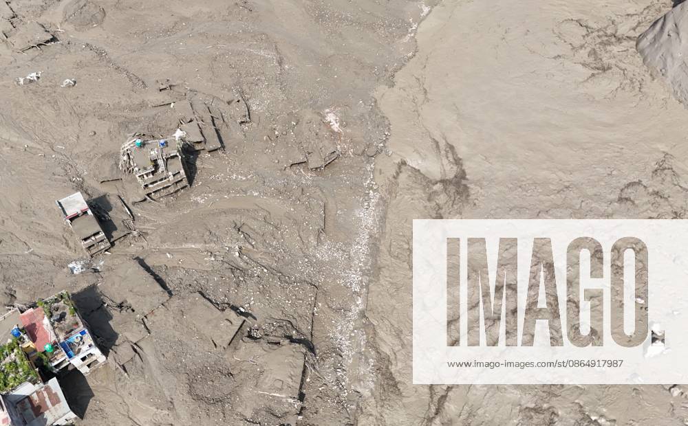 An aerial view shows buildings and infrastructure damaged along the swollen Trishuli River following a massive flash flood triggered by an avalanche of ice and rock in the upper Lhende River on the Tibetan side, in Nuwakot district, Nepal, on Wednesday, August 26, 2026. The sudden flood swept through communities along the Bhote Koshi and Trishuli river systems, destroying homes, roads and bridges and leaving widespread devastation downstream. Nuwakot Nepal - ZUMAg200 20260826_zap_g200_022