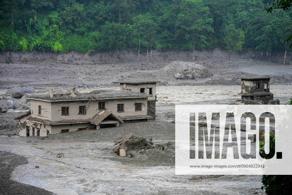 NUWAKOT, NEPAL - AUGUST 26: An aftermath view of flash floods and mudslides along the Trishuli River in Nuwakot, Nepal, on August 26, 2026. A catastrophic flash flood swept through Nepalâ€⠢s northern border region after an ice-and-rock avalanche, reportedly triggered by an earthquake, caused a sudden surge in the Lhende River on the Nepal-China border and sent massive volumes of water, mud and debris downstream into the Bhote Koshi and Trishuli river systems. The disaster devastated settlements in Rasuwa and Nuwakot districts, sweeping away homes, roads, bridges, vehicles and other infrastructure and severely damaging hydropower and power facilities. In Nuwakot, riverside settlements includin - ZUMAs330 20260826_zsp_s330_003