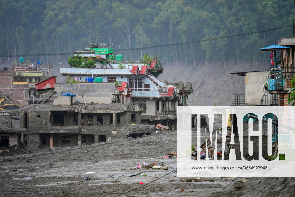 NUWAKOT, NEPAL - AUGUST 26: An aftermath view of flash floods and mudslides along the Trishuli River in Nuwakot, Nepal, on August 26, 2026. A catastrophic flash flood swept through Nepalâ€⠢s northern border region after an ice-and-rock avalanche, reportedly triggered by an earthquake, caused a sudden surge in the Lhende River on the Nepal-China border and sent massive volumes of water, mud and debris downstream into the Bhote Koshi and Trishuli river systems. The disaster devastated settlements in Rasuwa and Nuwakot districts, sweeping away homes, roads, bridges, vehicles and other infrastructure and severely damaging hydropower and power facilities. In Nuwakot, riverside settlements includin - ZUMAs330 20260826_zsp_s330_015