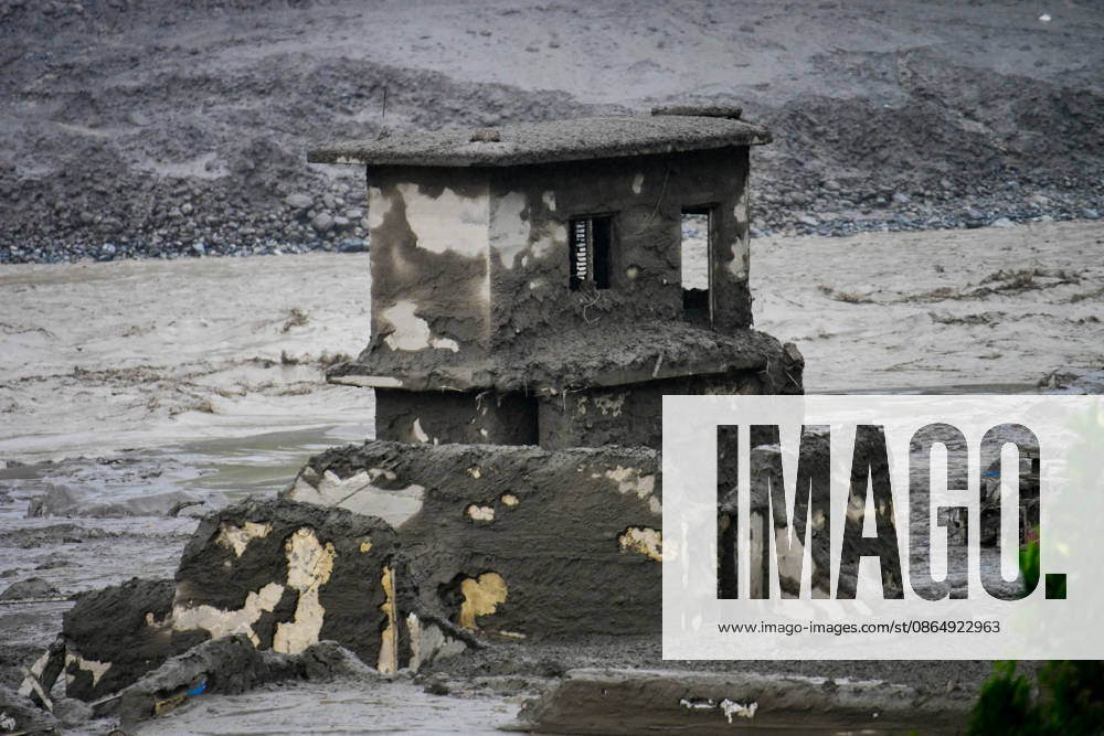 NUWAKOT, NEPAL - AUGUST 26: An aftermath view of flash floods and mudslides along the Trishuli River in Nuwakot, Nepal, on August 26, 2026. A catastrophic flash flood swept through Nepalâ€⠢s northern border region after an ice-and-rock avalanche, reportedly triggered by an earthquake, caused a sudden surge in the Lhende River on the Nepal-China border and sent massive volumes of water, mud and debris downstream into the Bhote Koshi and Trishuli river systems. The disaster devastated settlements in Rasuwa and Nuwakot districts, sweeping away homes, roads, bridges, vehicles and other infrastructure and severely damaging hydropower and power facilities. In Nuwakot, riverside settlements includin - ZUMAs330 20260826_zsp_s330_004