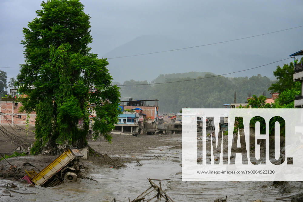 NUWAKOT, NEPAL - AUGUST 26: An aftermath view of flash floods and mudslides along the Trishuli River in Nuwakot, Nepal, on August 26, 2026. A catastrophic flash flood swept through Nepalâ€⠢s northern border region after an ice-and-rock avalanche, reportedly triggered by an earthquake, caused a sudden surge in the Lhende River on the Nepal-China border and sent massive volumes of water, mud and debris downstream into the Bhote Koshi and Trishuli river systems. The disaster devastated settlements in Rasuwa and Nuwakot districts, sweeping away homes, roads, bridges, vehicles and other infrastructure and severely damaging hydropower and power facilities. In Nuwakot, riverside settlements includin - ZUMAs330 20260826_zsp_s330_019