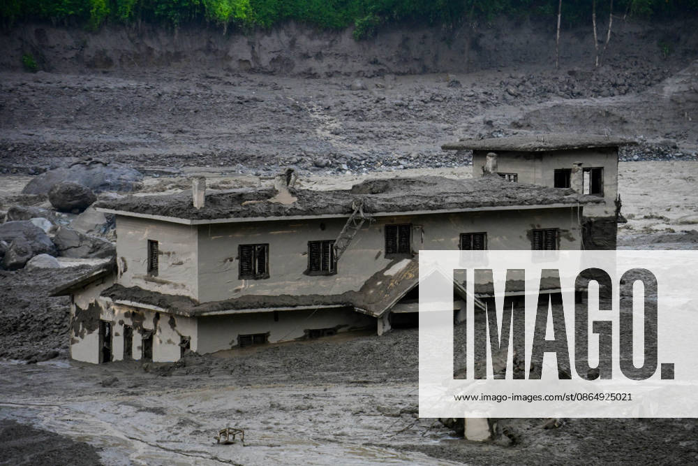 NUWAKOT, NEPAL - AUGUST 26: An aftermath view of flash floods and mudslides along the Trishuli River in Nuwakot, Nepal, on August 26, 2026. A catastrophic flash flood swept through NepalÃ¢â‚¬â ¢s northern border region after an ice-and-rock avalanche, reportedly triggered by an earthquake, caused a sudden surge in the Lhende River on the Nepal-China border and sent massive volumes of water, mud and debris downstream into the Bhote Koshi and Trishuli river systems. The disaster devastated settlements in Rasuwa and Nuwakot districts, sweeping away homes, roads, bridges, vehicles and other infrastructure and severely damaging hydropower and power facilities. In Nuwakot, riverside settlements includin - ZUMAs330 20260826_zsp_s330_036