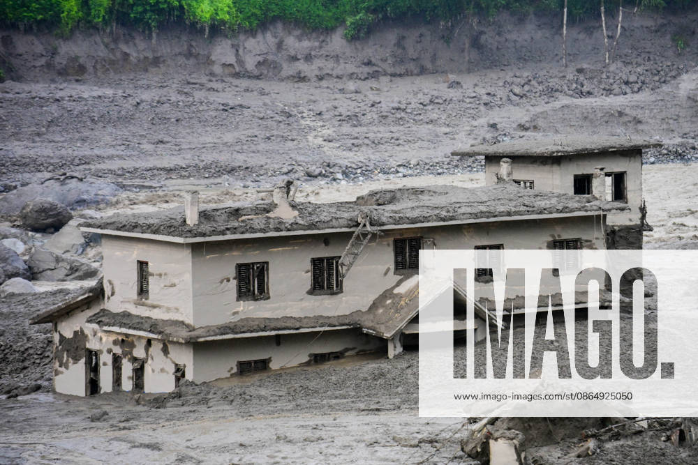 NUWAKOT, NEPAL - AUGUST 26: An aftermath view of flash floods and mudslides along the Trishuli River in Nuwakot, Nepal, on August 26, 2026. A catastrophic flash flood swept through Nepalâ€⠢s northern border region after an ice-and-rock avalanche, reportedly triggered by an earthquake, caused a sudden surge in the Lhende River on the Nepal-China border and sent massive volumes of water, mud and debris downstream into the Bhote Koshi and Trishuli river systems. The disaster devastated settlements in Rasuwa and Nuwakot districts, sweeping away homes, roads, bridges, vehicles and other infrastructure and severely damaging hydropower and power facilities. In Nuwakot, riverside settlements includin - ZUMAs330 20260826_zsp_s330_040