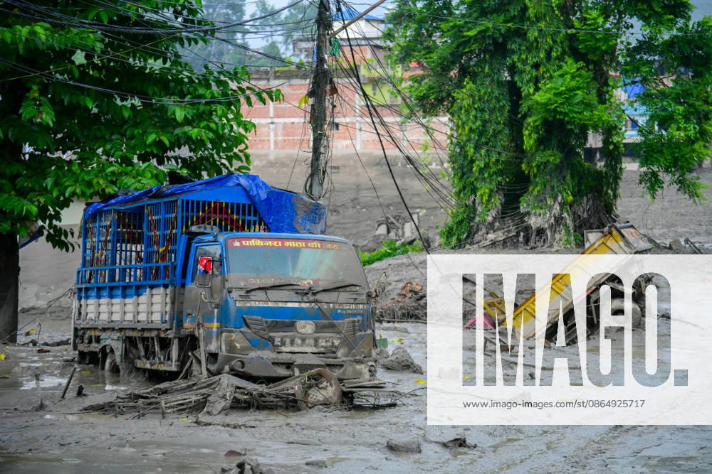 NUWAKOT, NEPAL - AUGUST 26: An aftermath view of flash floods and mudslides along the Trishuli River in Nuwakot, Nepal, on August 26, 2026. A catastrophic flash flood swept through Nepalâ€⠢s northern border region after an ice-and-rock avalanche, reportedly triggered by an earthquake, caused a sudden surge in the Lhende River on the Nepal-China border and sent massive volumes of water, mud and debris downstream into the Bhote Koshi and Trishuli river systems. The disaster devastated settlements in Rasuwa and Nuwakot districts, sweeping away homes, roads, bridges, vehicles and other infrastructure and severely damaging hydropower and power facilities. In Nuwakot, riverside settlements includin - ZUMAs330 20260826_zsp_s330_053