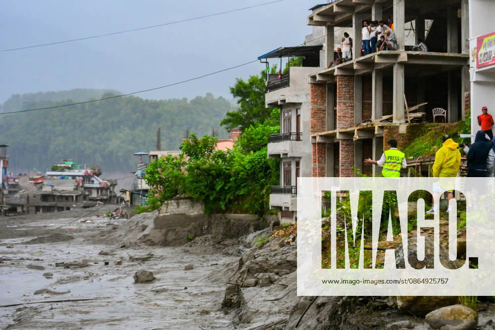 NUWAKOT, NEPAL - AUGUST 26: An aftermath view of flash floods and mudslides along the Trishuli River in Nuwakot, Nepal, on August 26, 2026. A catastrophic flash flood swept through Nepalâ€⠢s northern border region after an ice-and-rock avalanche, reportedly triggered by an earthquake, caused a sudden surge in the Lhende River on the Nepal-China border and sent massive volumes of water, mud and debris downstream into the Bhote Koshi and Trishuli river systems. The disaster devastated settlements in Rasuwa and Nuwakot districts, sweeping away homes, roads, bridges, vehicles and other infrastructure and severely damaging hydropower and power facilities. In Nuwakot, riverside settlements includin - ZUMAs330 20260826_zsp_s330_056