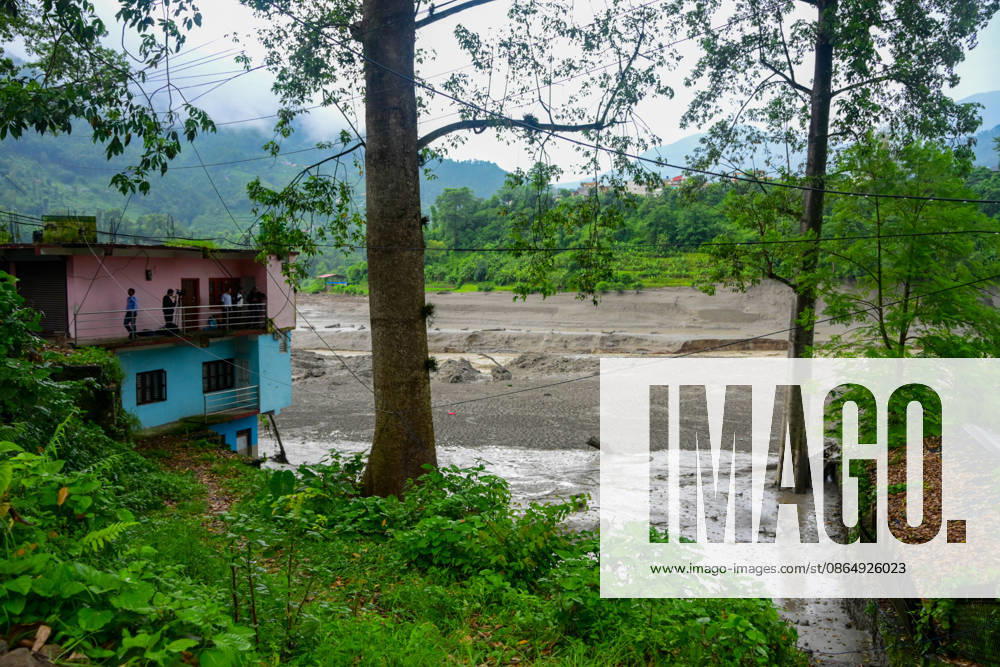 NUWAKOT, NEPAL - AUGUST 26: An aftermath view of flash floods and mudslides along the Trishuli River in Nuwakot, Nepal, on August 26, 2026. A catastrophic flash flood swept through NepalÃ¢â‚¬â ¢s northern border region after an ice-and-rock avalanche, reportedly triggered by an earthquake, caused a sudden surge in the Lhende River on the Nepal-China border and sent massive volumes of water, mud and debris downstream into the Bhote Koshi and Trishuli river systems. The disaster devastated settlements in Rasuwa and Nuwakot districts, sweeping away homes, roads, bridges, vehicles and other infrastructure and severely damaging hydropower and power facilities. In Nuwakot, riverside settlements includin - ZUMAs330 20260826_zsp_s330_067