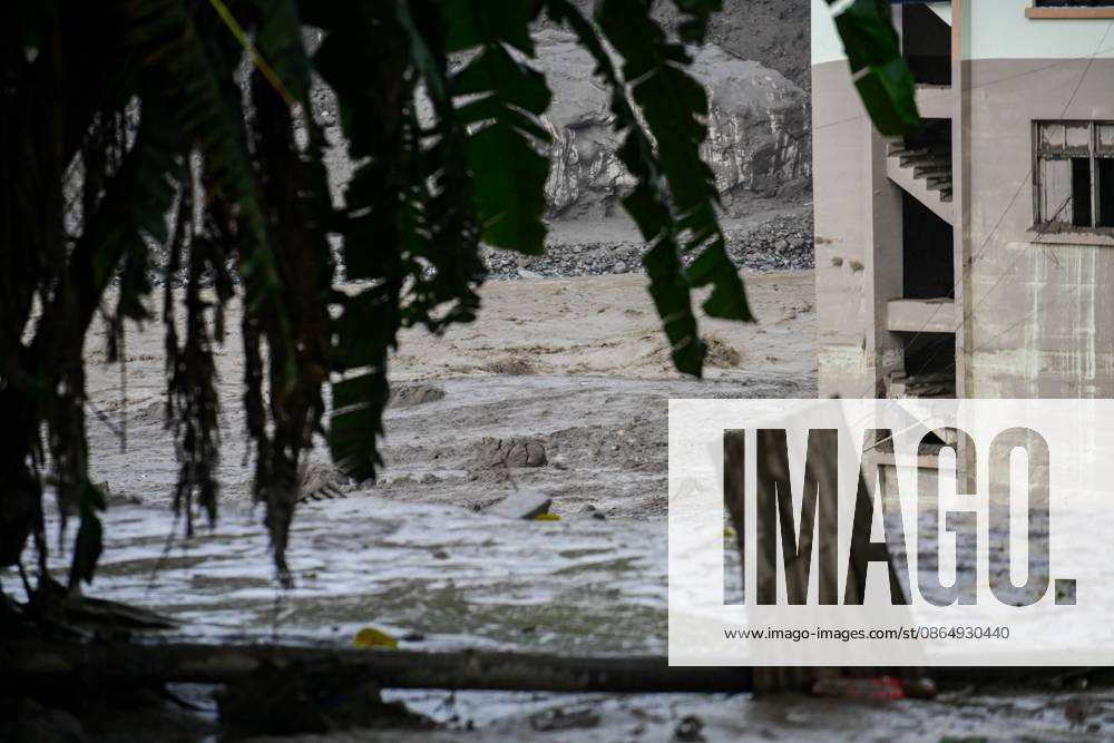 NUWAKOT, NEPAL - AUGUST 26, 2026: An aftermath view of flash floods and mudslides along the Trishuli River. A catastrophic flash flood swept through NepalÃ¢â‚¬â ¢s northern border region after an ice-and-rock avalanche, reportedly triggered by an earthquake, caused a sudden surge in the Lhende River on the Nepal-China border and sent massive volumes of water, mud and debris downstream into the Bhote Koshi and Trishuli river systems. The disaster devastated settlements in Rasuwa and Nuwakot districts, sweeping away homes, roads, bridges, vehicles and other infrastructure and severely damaging hydropower and power facilities. In Nuwakot, riverside settlements including Trishuli Bazaar, Devighat, Betr - ZUMAq101 20260826_zna_q101_054