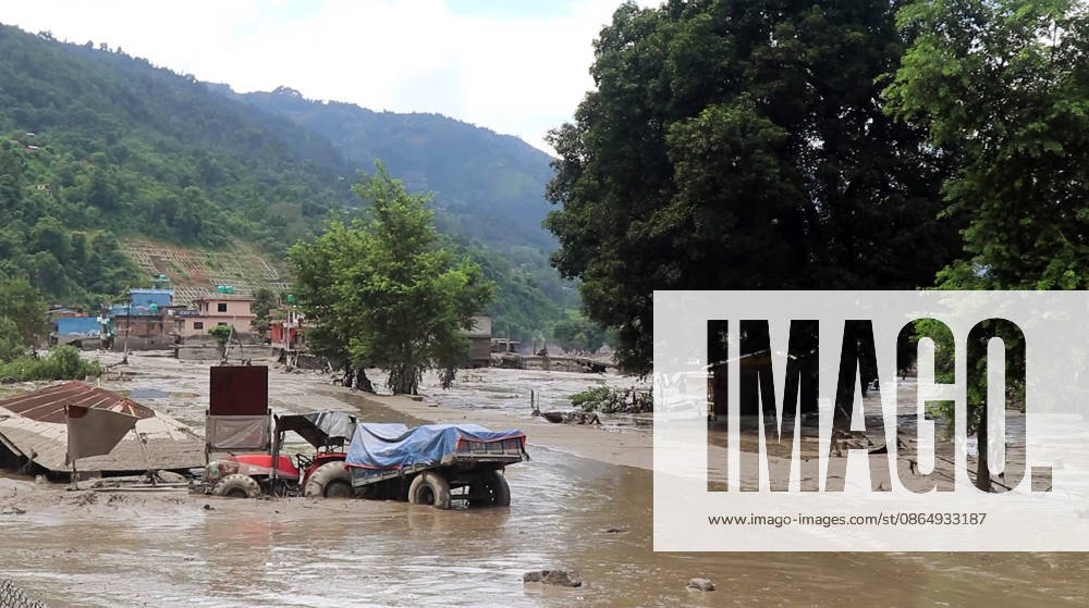 Flash flood ravages Nepals Rasuwa Rasuwa Nepal , Aug 26 (ANI): An area submerged in mud-laden floodwaters, with vehicles and houses damaged following a flash flood caused by an outburst in the Bhotekoshi River, in Rasuwa on Wednesday. Around 105 Indians among the foreign nationals reported missing after the flash flood. (RSS Nepal ANI Video Grab) Rasuwa Nepal