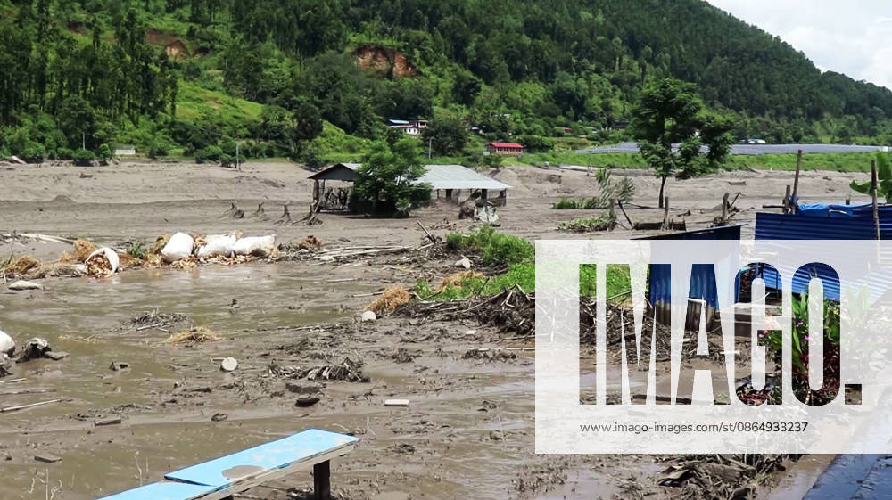 Flash flood ravages Nepals Rasuwa Rasuwa Nepal , Aug 26 (ANI): A view of an area devastated by mud-laden floodwaters following a flash flood caused by an outburst in the Bhotekoshi River, in Rasuwa on Wednesday. Around 105 Indians among the foreign nationals reported missing after the flash flood. (RSS Nepal ANI Video Grab) Rasuwa Nepal